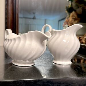 Creamer and gravy boat dishes.